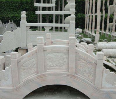 公園景觀(guān)晚霞紅石拱橋